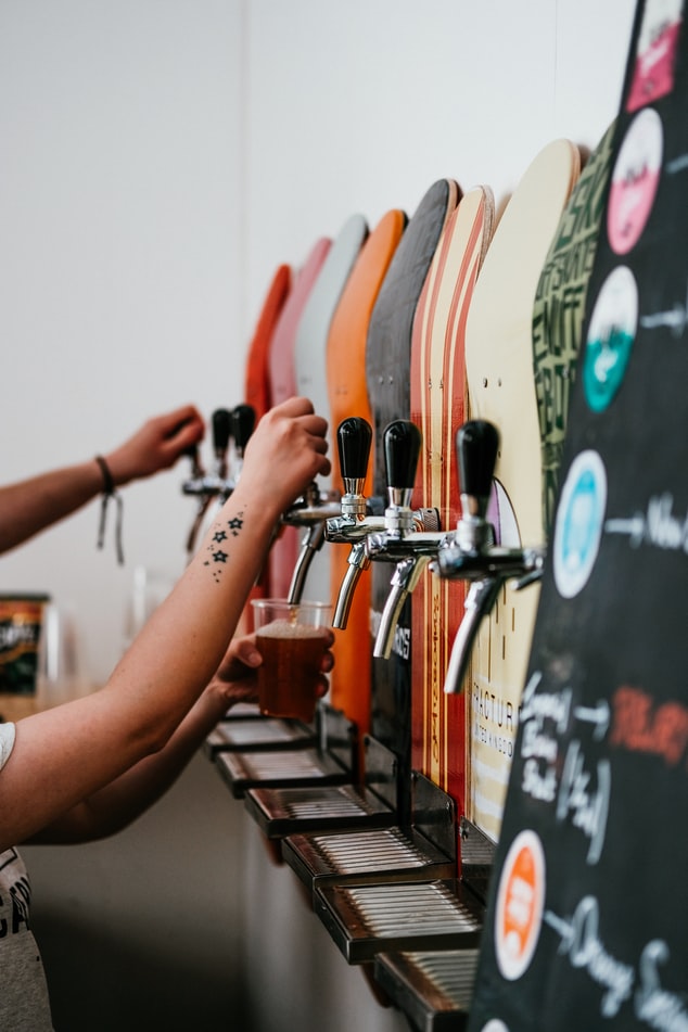 beer being pulled, ready to be served